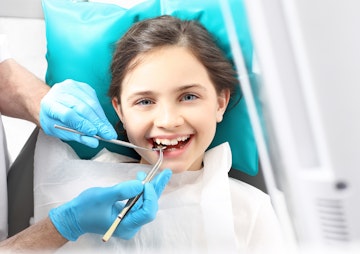 child having dental checkup