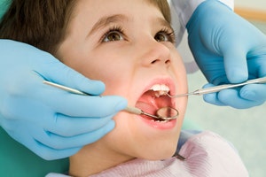 child having dental checkup