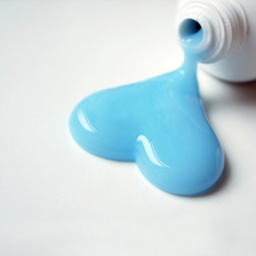 blue toothpaste in the shape of a love heart